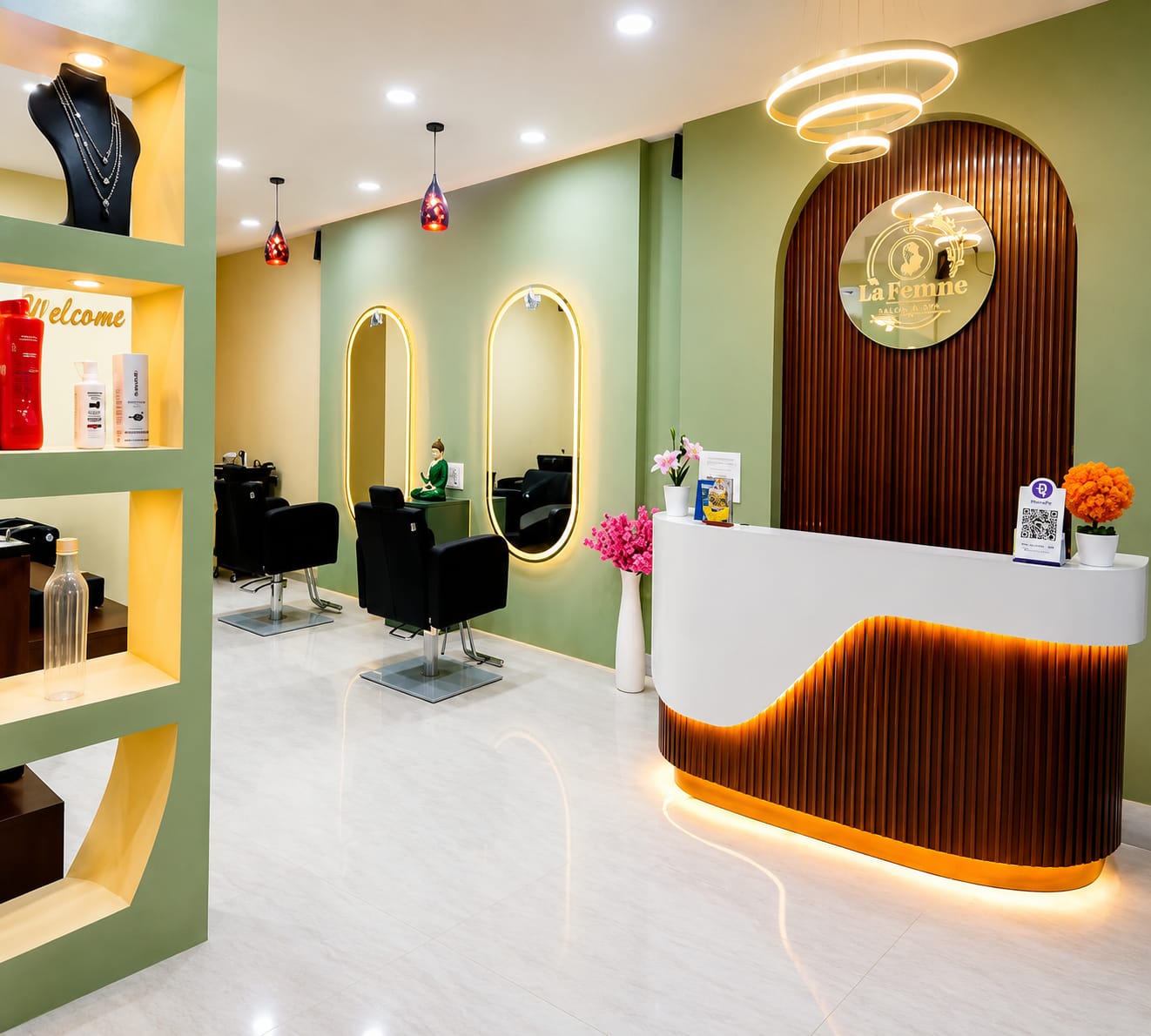 La Femme Glam Spot reception with curved gold-lit desk
