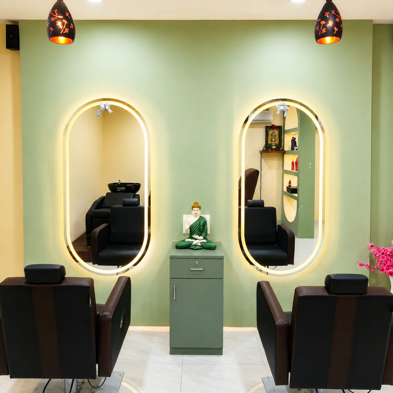 Twin arched backlit mirrors with styling chairs